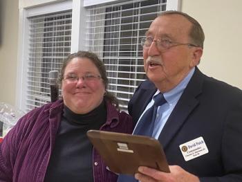 The newly created “Commander’s Award” is presented to Suzanne Harmon by David Patch. Jim Singer photo