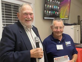Ed Harmon, left, presents Arthur Richardson with the Sons of the Legion (Squadron 36) award. Jim Singer photo