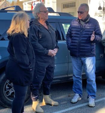 Three members of the Sherman family, Linda, Barry and Paul, talk before the ceremony. KEVIN BURNHAM/Boothbay Register