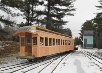 The replica coach #9 at WW&F in Alna out of the shop for the first time, bound for the Sheepscot yard and Bay 4 for interior work. Courtesy of WW&F Railway