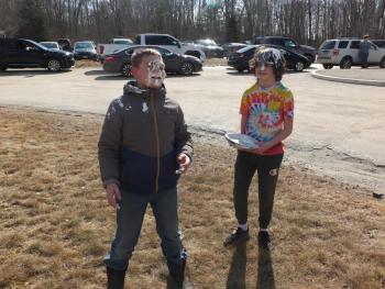 Edgecomb sixth graders Jackson Zehm, left, and Ethan Clark won the right to put a pie in the faces of their math teacher Nicole Ellis and Principal Dr. Christina Boursaw on International Pi Day. But the two decided to put a pie in their own face on March 14. BILL PEARSON/Boothbay Register