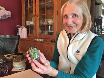 Alina Blakesley designed and painted this Ukrainian Easter egg in blue and yellow symbolizing the Ukrainian flag. LISA KRISTOFF/Boothbay Register