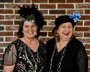 Sister flappers Kerrin Erhard and Mindy LeBrecque look for the dance floor. Bob Crink photo