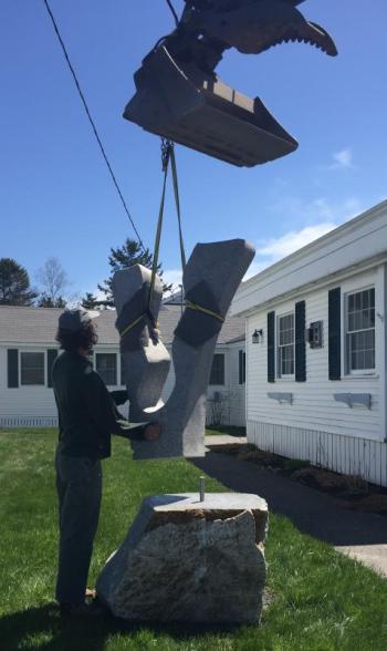 Lowering “Voyage” onto the base May 5. LISA KRISTOFF/Boothbay Register