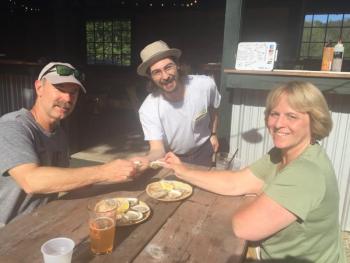 Bob and Janice Cotier stopped by for a dozen oysters and bevvies served up by the ever personable Jeremiah Ward of Brother Shucker. LISA KRISTOFF/Boothbay Register