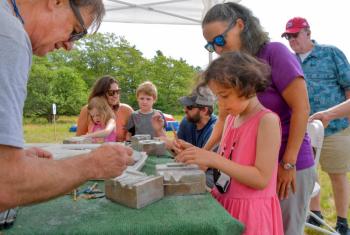 Sculpting soapstone. Peter Southwick photo