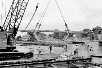 A crane operator moves a bridge segment. PHIL DI VECE/photo