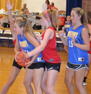 Boothbay’s Magen Burge is surrounded by two Camden Hills defenders July 30 in the Seahawks’ first Lobster Jam game. Boothbay lost to Camden Hills and twice to Lincoln Academy in the two-day tournament. BILL PEARSON/Boothbay Register