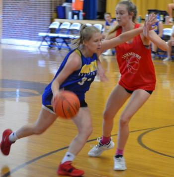 Boothbay’s Bella Orr drives against a Camden defender in the Seahawks’ loss to the Windjammers. BILL PEARSON/Boothbay Register
