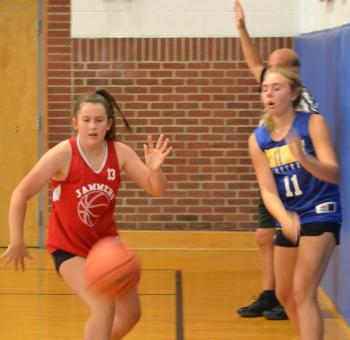 Boothbay’s Magen Burge inbounds the ball July 30 against a Camden Hills defender. BILL PEARSON/Boothbay Register