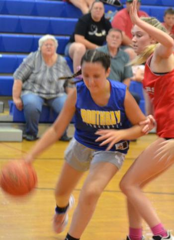 Lady Seahawk Sophie White drives baseline July 30 versus Camden Hills. BILL PEARSON/Boothbay Register