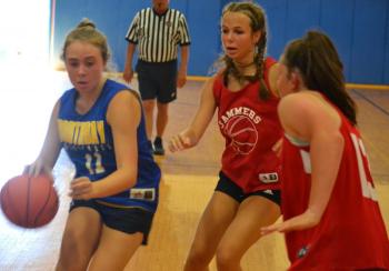 Camden Hills looks to apply a double-team against Boothbay’s Magen Burge July 30 in the Lobster Jam tournament. BILL PEARSON/Boothbay Register