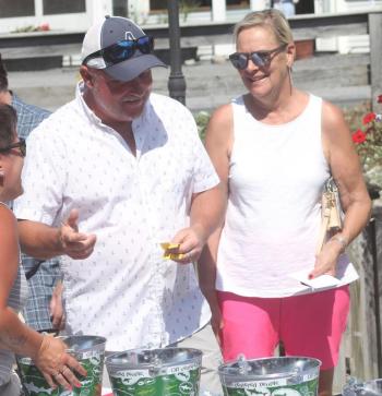 Mark and Dianne Gimbel make a bid. STEVE EDWARDS/Boothbay Register