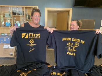 Barb Carbone-Crocker and Allison Beals display Lobster Jam tournament T-shirts. Each of the six teams received these T-shirts. BILL PEARSON/Boothbay Register