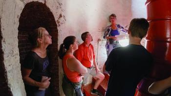 Photographers and tour guide in the Monhegan Lighthouse. Mike Leonard photo (www.phototourismbymike.com)