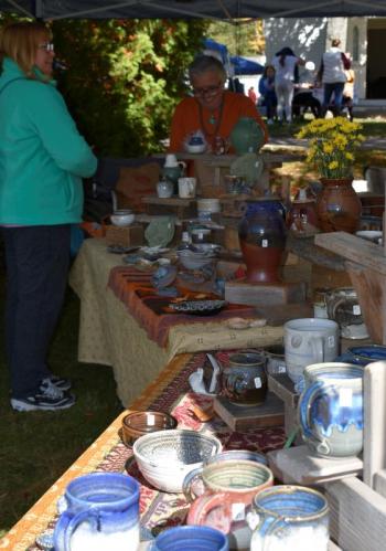 Ann Hedgecock rings out another customer. LISA KRISTOFF/Boothbay Register