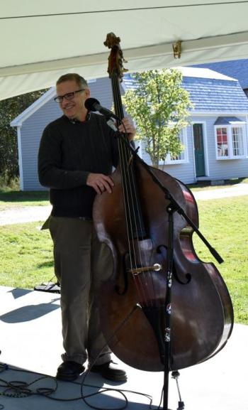Jerry Adams of Sky Blue Canoe plays a decades-old stand-up bass from Germany. LISA KRISTOFF/Boothbay Register