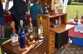 Duane Pinkham’s bottle lamps. LISA KRISTOFF/Boothbay Register