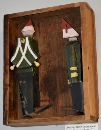 Andre Benoit’s “Put back in the box (wooden soldiers)” is one of his works in the 2022 Art in the Square show and sale at BRAF. Andre Benoit