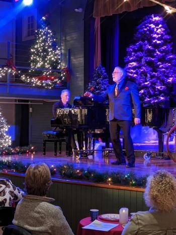 John Adams draws laughter from the crowd with his witty lyrics. CANDI JONETH/Boothbay Register