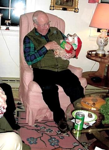 Coast Guard Auxiliary member, Dr. David Racicot, proudly shows his ultimate Yankee Swap! Howard Wright photo