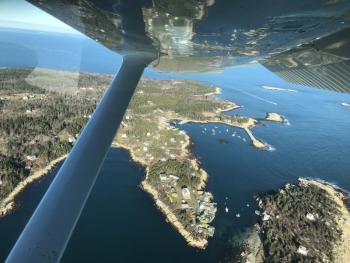 The view from the air of the harbor on Matinicus Island, where the author conducted a recent National Audubon Christmas Bird Count. Courtesy of Jeff Wells. #bird-column, #Jeff and Allison Wells, #boothbay register, #birds, #maine, #christmas bird count, #matinicus island