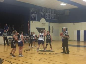 Overtime is about to begin during the Feb. 6 playoff between the BRES Wildcats and Bristol’s Blue Devils. LISA KRISTOFF/Boothbay Register