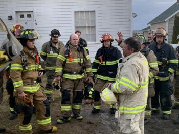 Boothbay Harbor Fire Chief Nick Upham talks to the firefighters during the training session. KEVIN BURNHAM/Boothbay Register