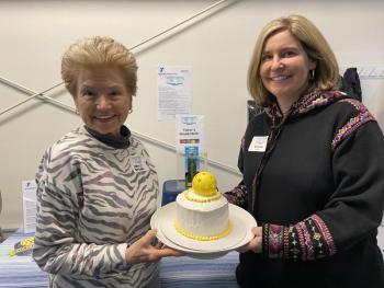 Nancy Baker and her daughter Brooke Hollon hold up their special door prize for the “Turn Up the Lights” Pickleball Tournament on March 5. Courtesy of Allyson Goodwin