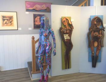“Iris, Queen of the Rainbow” by Hannah Neisbach and two “organic” women by André Benoit greeted art lovers and lovers of the annual Mainely Nude show at Boothbay Region Art Foundation.