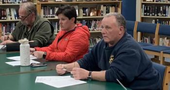 Chairman Steve Lorrain, left, told his fellow Community School District Trustees March 7, he plans to attend select board meetings to create wider participation in the elementary school cleanup and new building proposal. Also pictured are Trustees Ashleeann Lowery and Richard Hallinan, right. BILL PEARSON/Boothbay Register