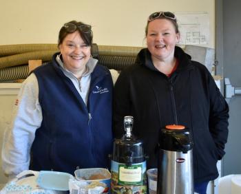 Sara Pinkham and Stacy Peters keep things running smoothly at the beverage table. LISA KRISTOFF/Boothbay Register