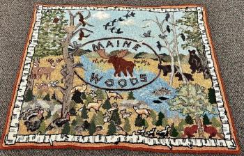 This outdoorsy-themed rug hooking is by Joan Dow, just one of the 23 Midcoast Fiber Artists in the May-June show at Southport Memorial Library. Courtesy of the artist Joan Dow