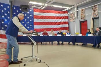 Merritt Blakeslee speaks to Boothbay Harbor town representatives, staff and voters during the town meeting May 6. FRITZ FREUDENBERGER/Boothbay Register
