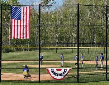 Local Little Leaguers take the field May 26 following the ribbon-cutting ceremony officially opening the new Clifford Park diamond. Michelle Amero photo