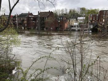 Recent rains caused the waters of Cobboseecontee Stream to rise 16 feet above normal, flooding into some buildings in downtown Gardiner. (Photo courtesy of Allison Wells) #bird-column, #jeff and allison wells, #boothbay register, #birds, #maine, #flood, #bald eagley