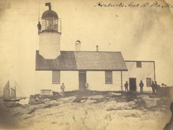 Built on a seawall at the water’s edge, this is the oldest known photograph of Hendricks Head’s 1829 lighthouse and keeper’s dwelling. Courtesy of National Archives