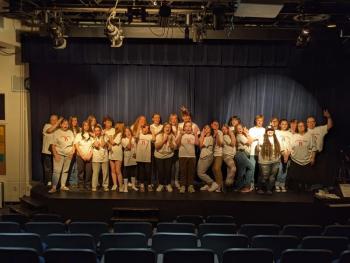 Full cast in Rydell High T-shirts provided by Coach Dennis Dacus. CANDI JONETH/Boothbay Register