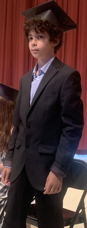 During the ceremony, sixth grade graduate Jeffery Buck was described with the trait of ambition. BILL PEARSON/Boothbay Register