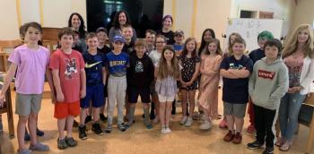 Boothbay Region Elementary School Assistant Principal Julianne Hansbury, third row middle, visits the 22 fourth graders, two teachers and one educational technician at the makeshift classroom June 1 at St. Columba’s Episcopal Church. BILL PEARSON/Boothbay Register
