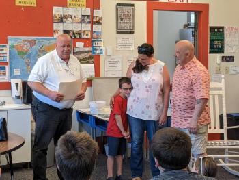 Aiden Nunan receives certificate of appreciation. CANDI JONETH/Boothbay Register