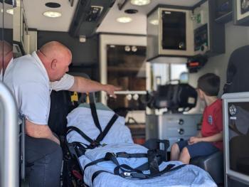 Aiden Nunan tours an ambulance. CANDI JONETH/Boothbay Register