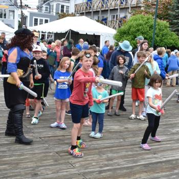 The Boothbay Harbor pirates prepare for the oncoming battle, hurling insults to intimidate the invaders. FRITZ FREUDENBERGER/Boothbay Register
