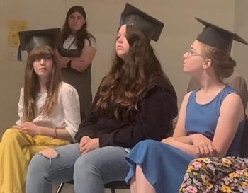 Graduates don mortarboards made by Edgecomb Eddy fifth graders. BILL PEARSON/Boothbay Register