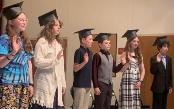 Edgecomb Eddy Class of 2023 members wave good-bye to elementary school June 22 during the sixth grade graduation ceremony. BILL PEARSON/Boothbay Register