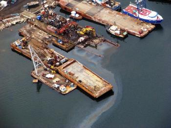 This pollution event (11/13/2012) in Portland, Maine’s inner harbor was observed, recorded, and reported by a CG Auxiliary aircraft. The event was reported via radio to CG Sector Northern New England immediately and photos taken by the Auxiliary Air Crew member were processed and forwarded to the Marine Safety Department at Sector HQ upon landing. Ted Chatham photo