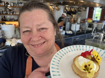 Sara Jenkins with Nina June's famous Lemon Curd Tartlet that is their "Into the Light!” offering, July proceeds from this dessert benefit Maine’s domestic abuse survivors. Photo by Patrisha McLean
