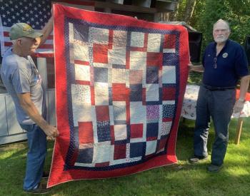 Veteran Ed Harmon received a “Quilt of Appreciation” Sept. 17 for his service in the U.S. Navy from 1966 to 1970. BILL PEARSON/Boothbay Register