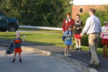 Principal Tom Landberg greets a student. FRITZ FREUDENBERGER/Boothbay Register