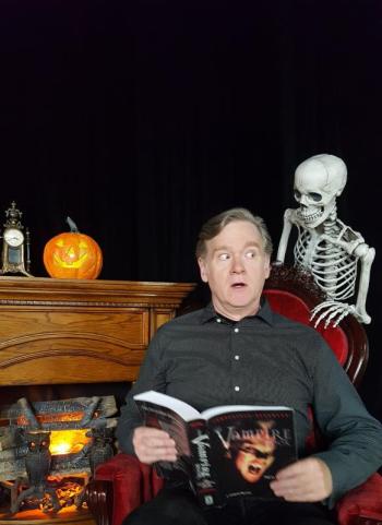 Kevin Kiley in one of his many humorous promotional photos for a Halloween Potluck and Scary Readings. Robert Mitchell photo